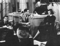 Кадр из фильма "Меченая женщина", реж. Ллойд Бэкон